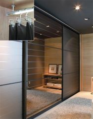 Orient Vidros - Closet com porta perfil com vidro reflect bronze e cabideiro com luz