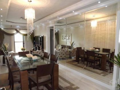 Orient Vidros - Parede revestida com espelho bisot�